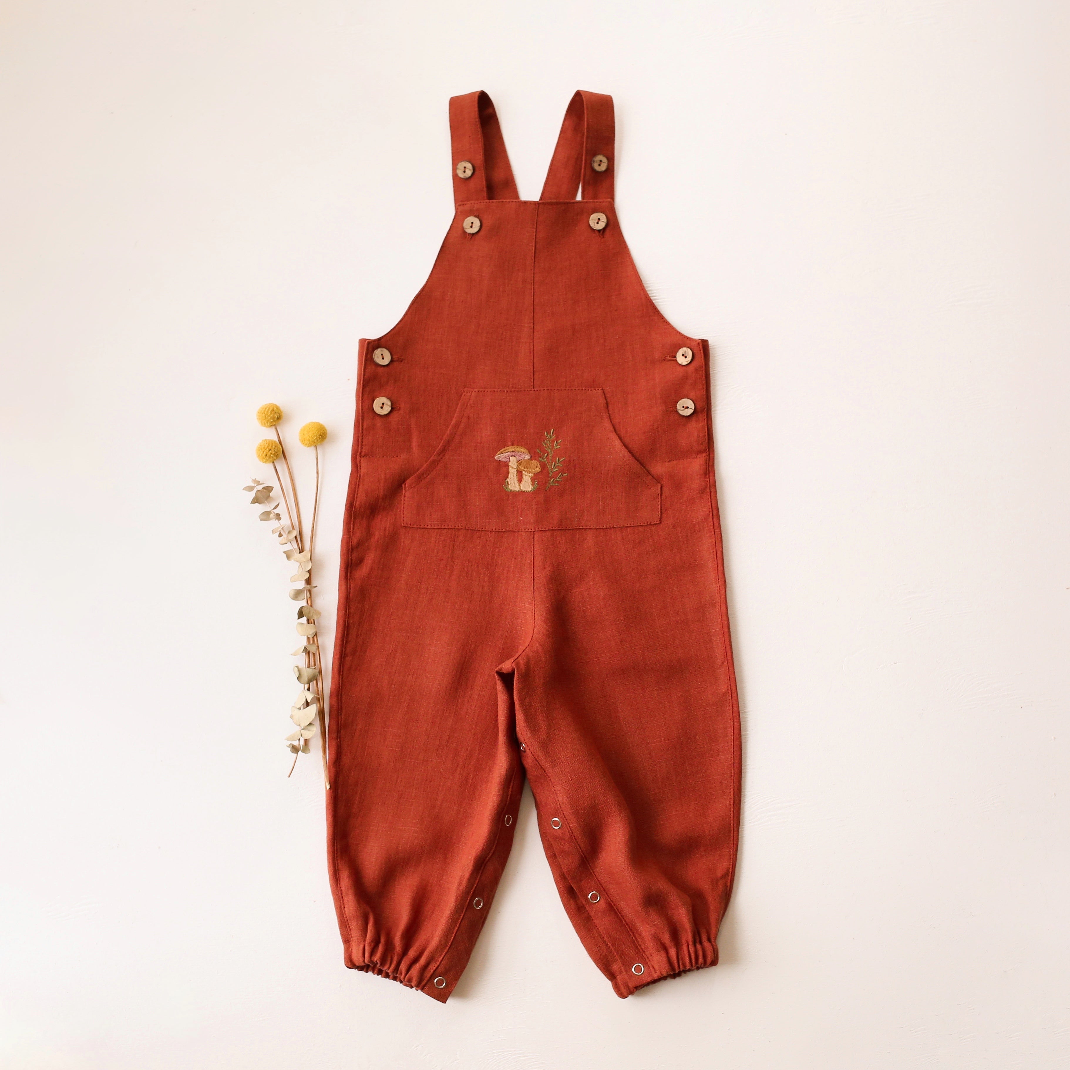 Rust Linen Kangaroo Pocket Buttoned Dungaree with "Mushrooms" Embroidery