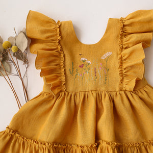 Amber Linen Ruffled Front Tiered Dress with “Meadow Flowers with Bee” Embroidery