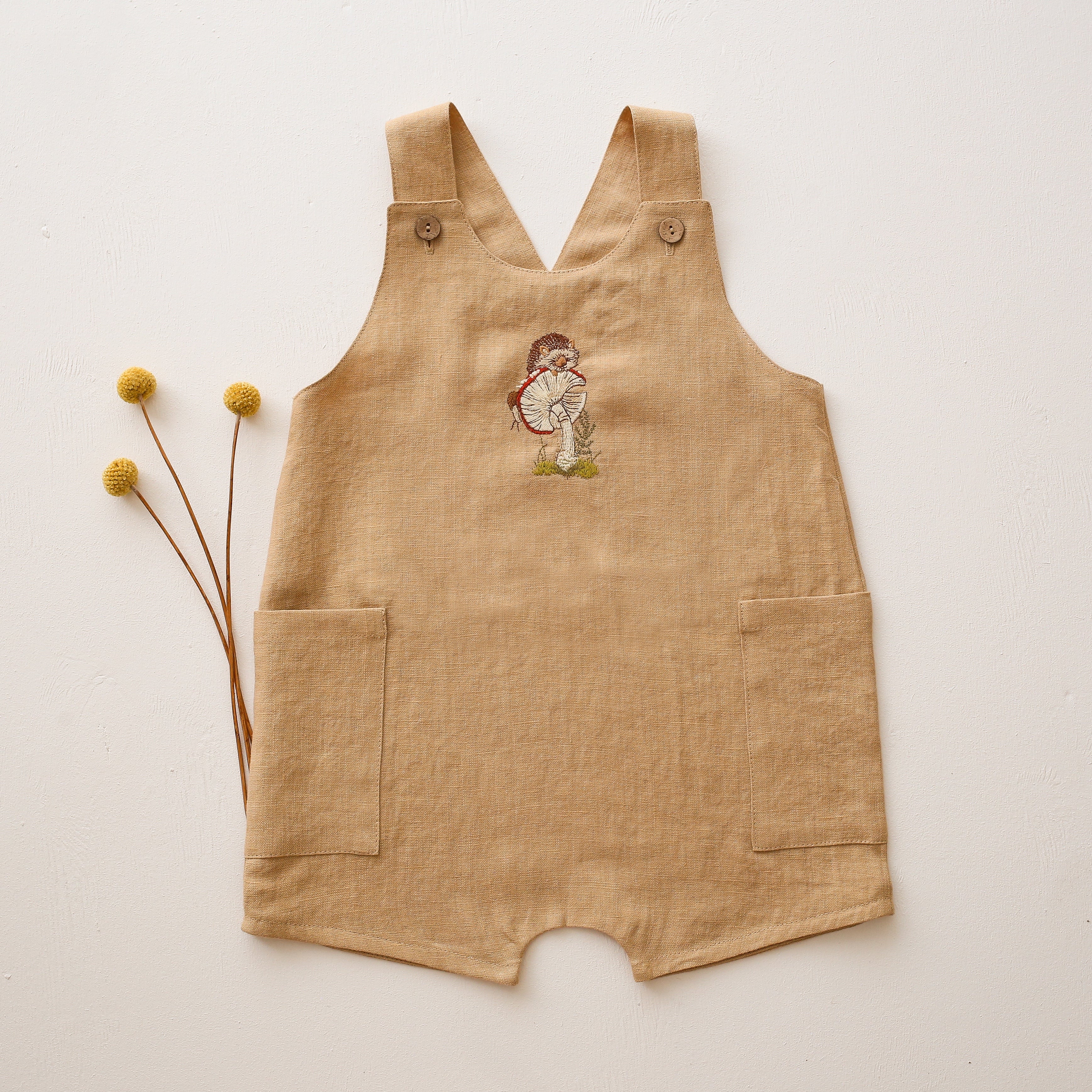 Melon Linen Button Front Jumpsuit with “Hedgehog on Toadstool” Embroidery