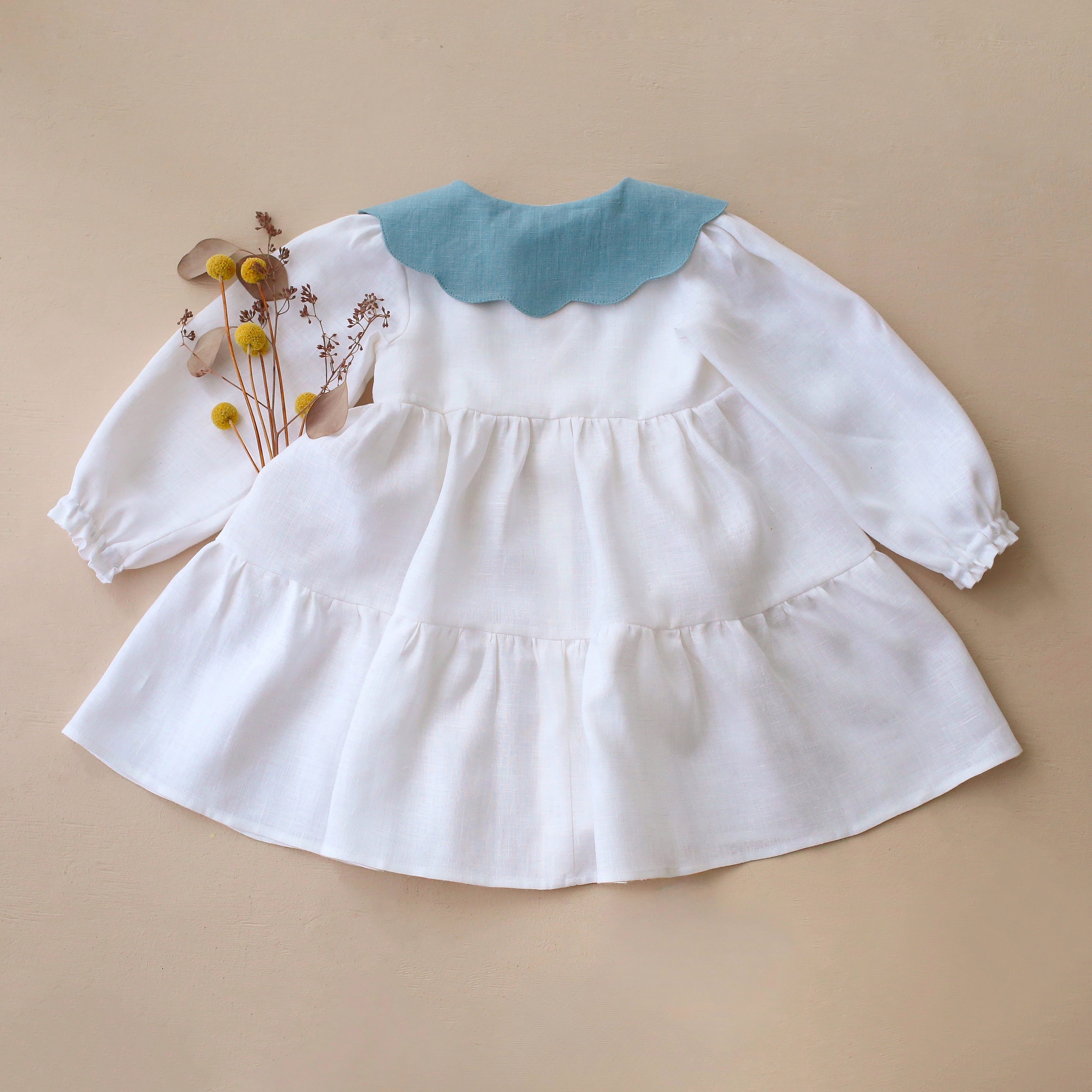 White Linen Long Sleeve Tiered Dress with Petal Collar in Chalky Blue Linen with "Wheat Flower Field" Embroidery