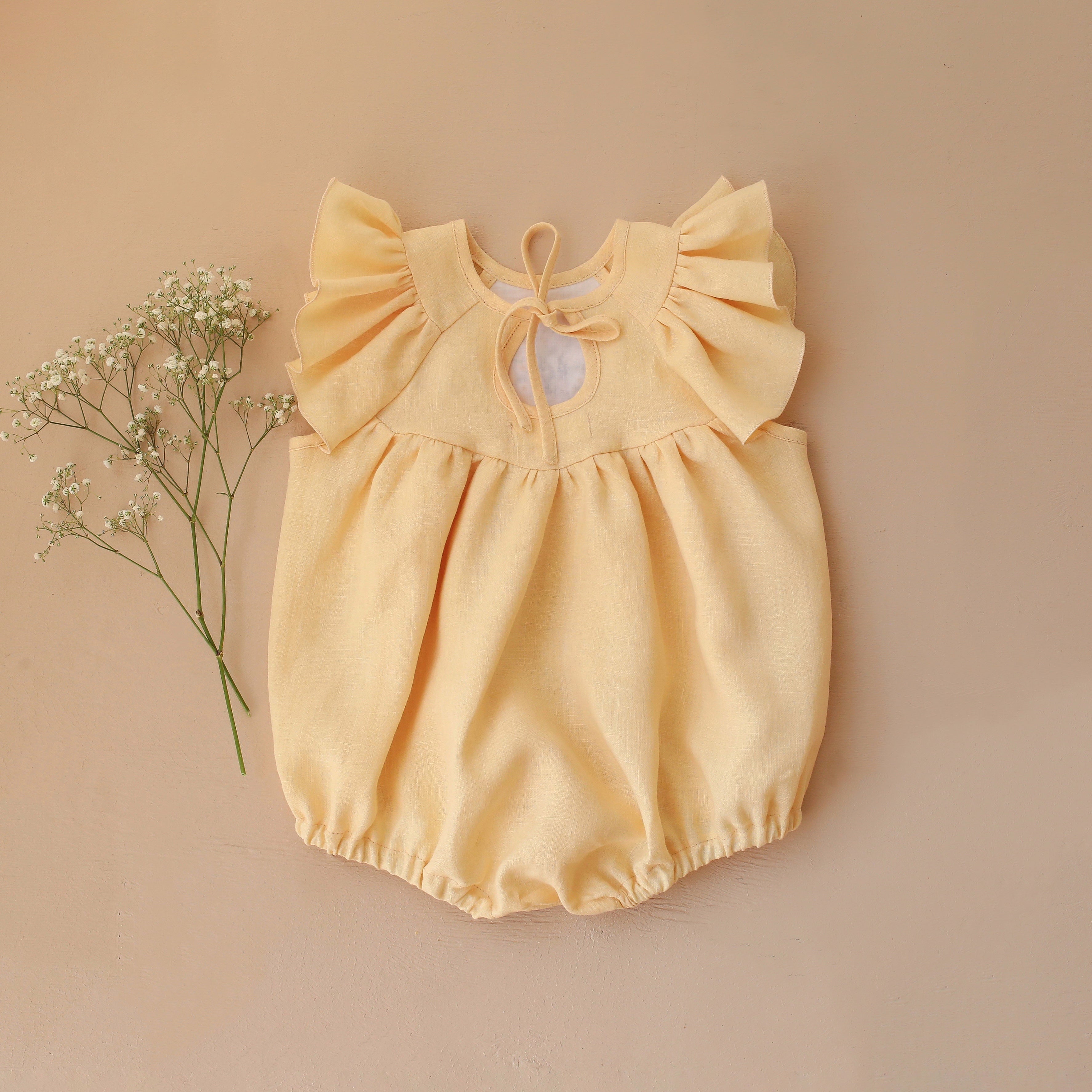 Vanilla Linen Flutter Sleeve Tie Back Bubble Playsuit with "Bunny in Daisy Wreath" Embroidery