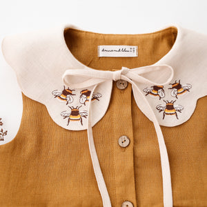 Mustard Linen Tiered Dress with Petal Collar in Ivory Linen with "3 Bumblebees" Embroidery