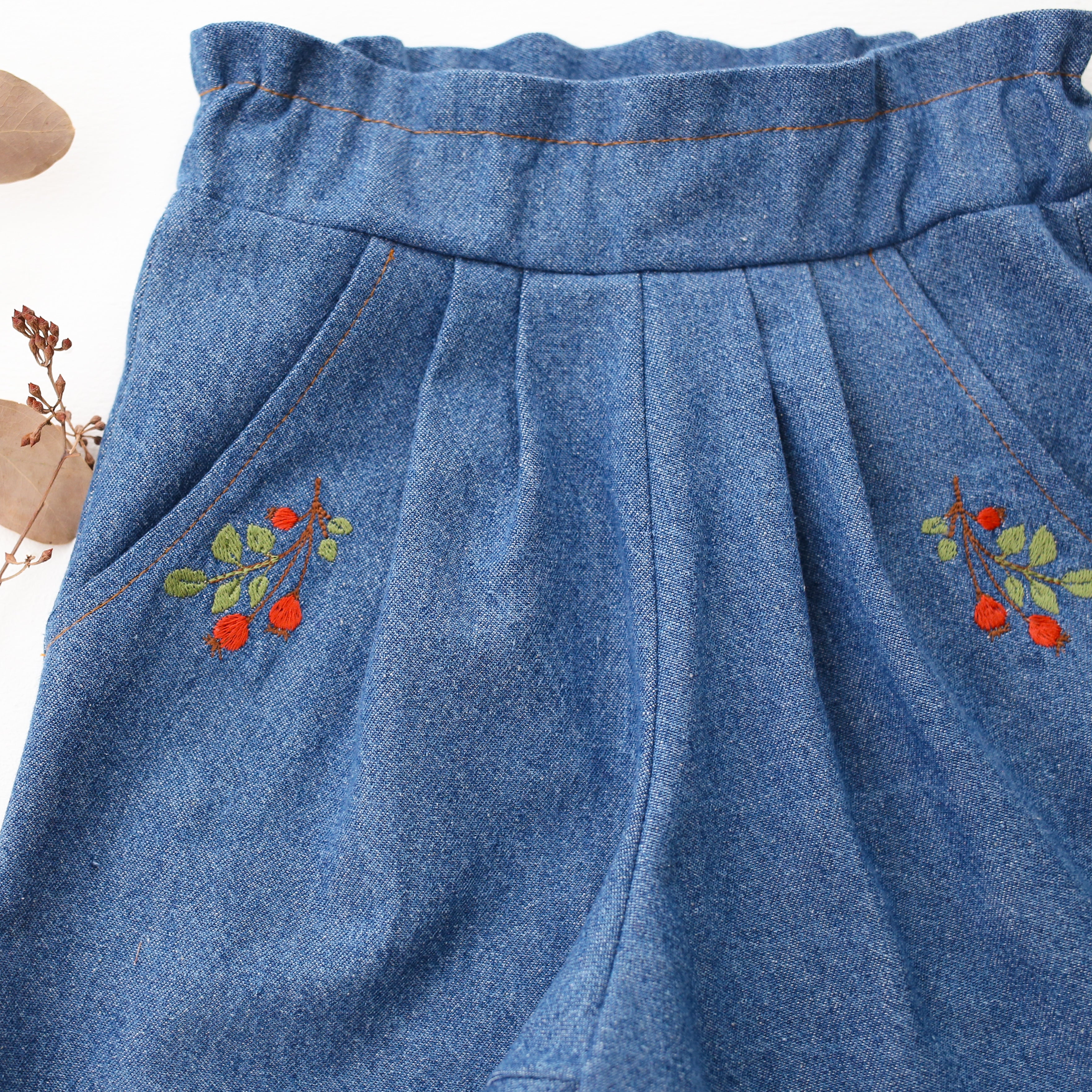 Dark Blue Denim Paperbag Waist Trousers with “Rosehip” Embroidery