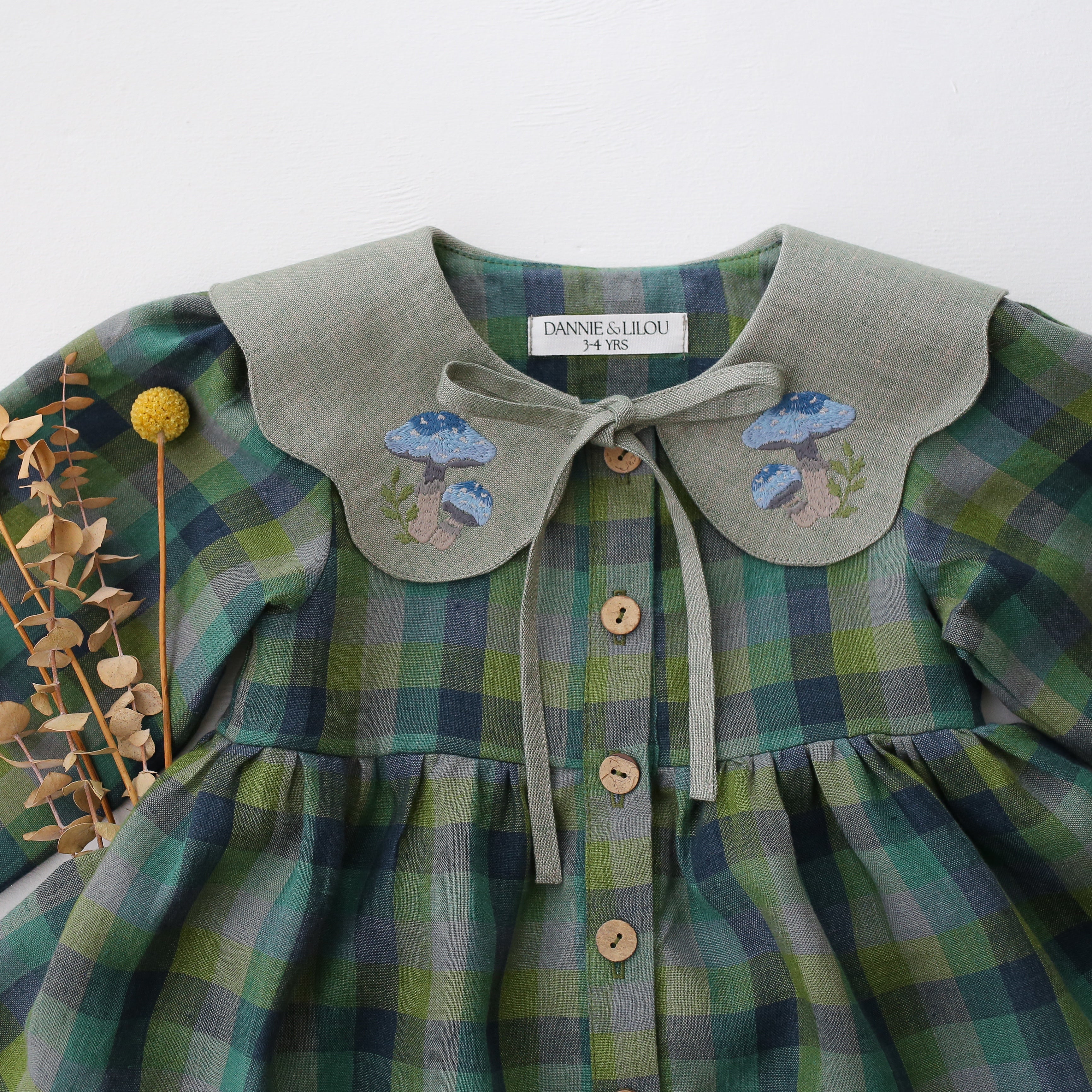 Moss Green Check Linen Long Sleeve Tiered Dress with Petal Collar in Green Smoke Linen with "Blue Mushrooms" Embroidery