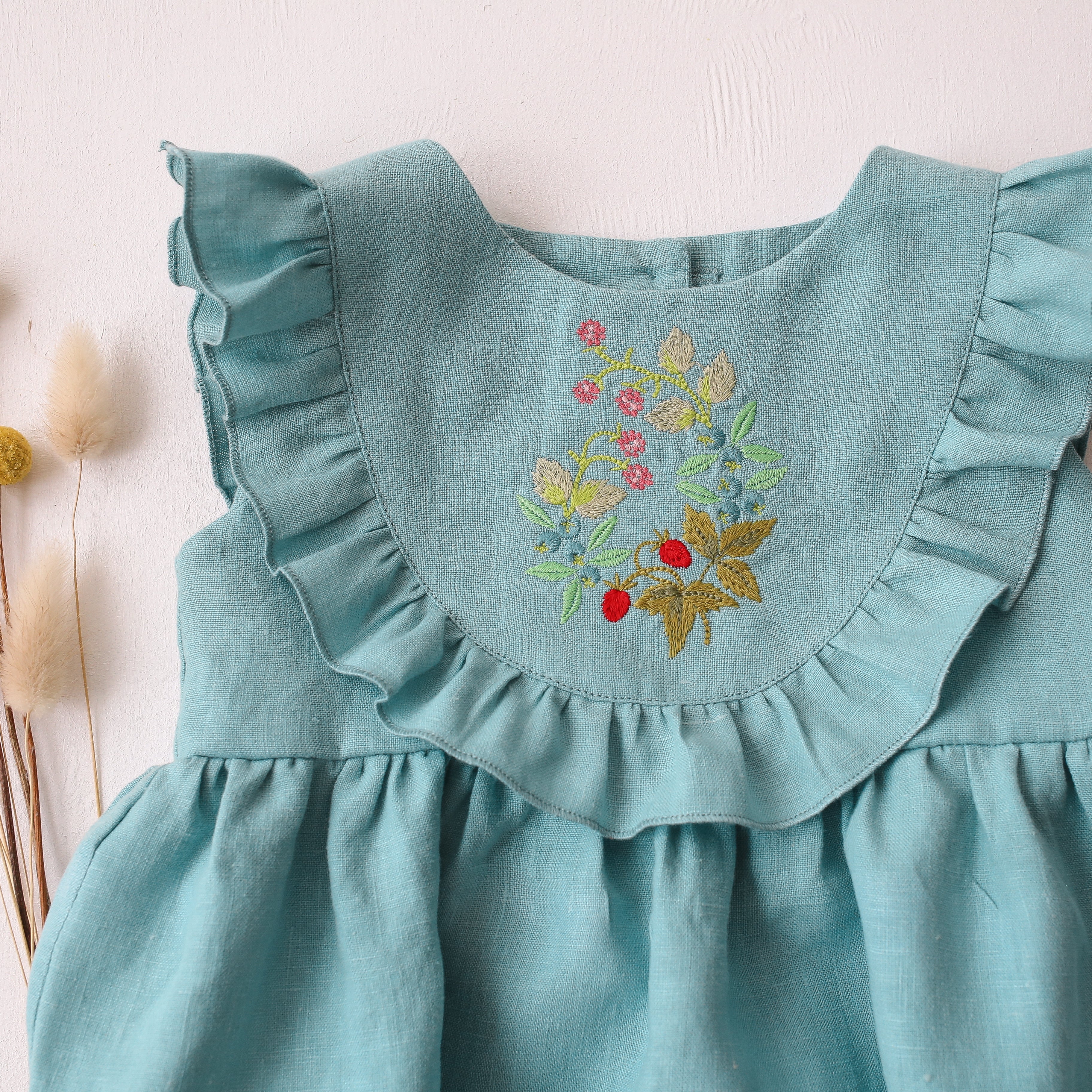 Duck Egg Blue Linen Ruffled Bodice Bubble Playsuit with “Berries” Embroidery