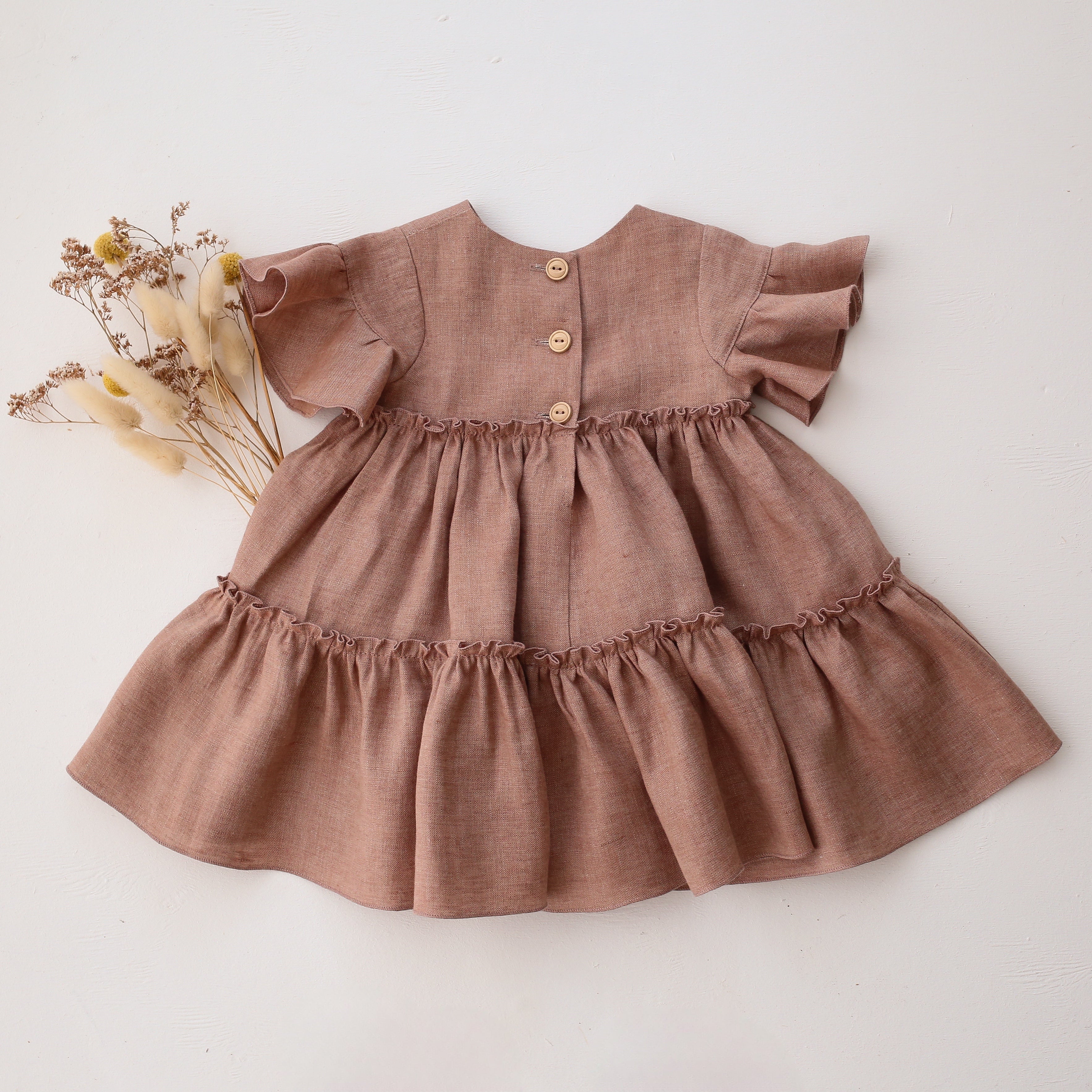 Rose Smoke Linen Flounce Sleeve Tiered Dress with "Strawberry" Embroid Dannie and Lilou Rose Smoke Linen Flounce Sleeve Tiered Dress with "Strawberry" Embroid Dannie and Lilou