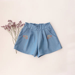 Light Denim Paperbag Waist Shorts with "Wild Bells" Embroidery