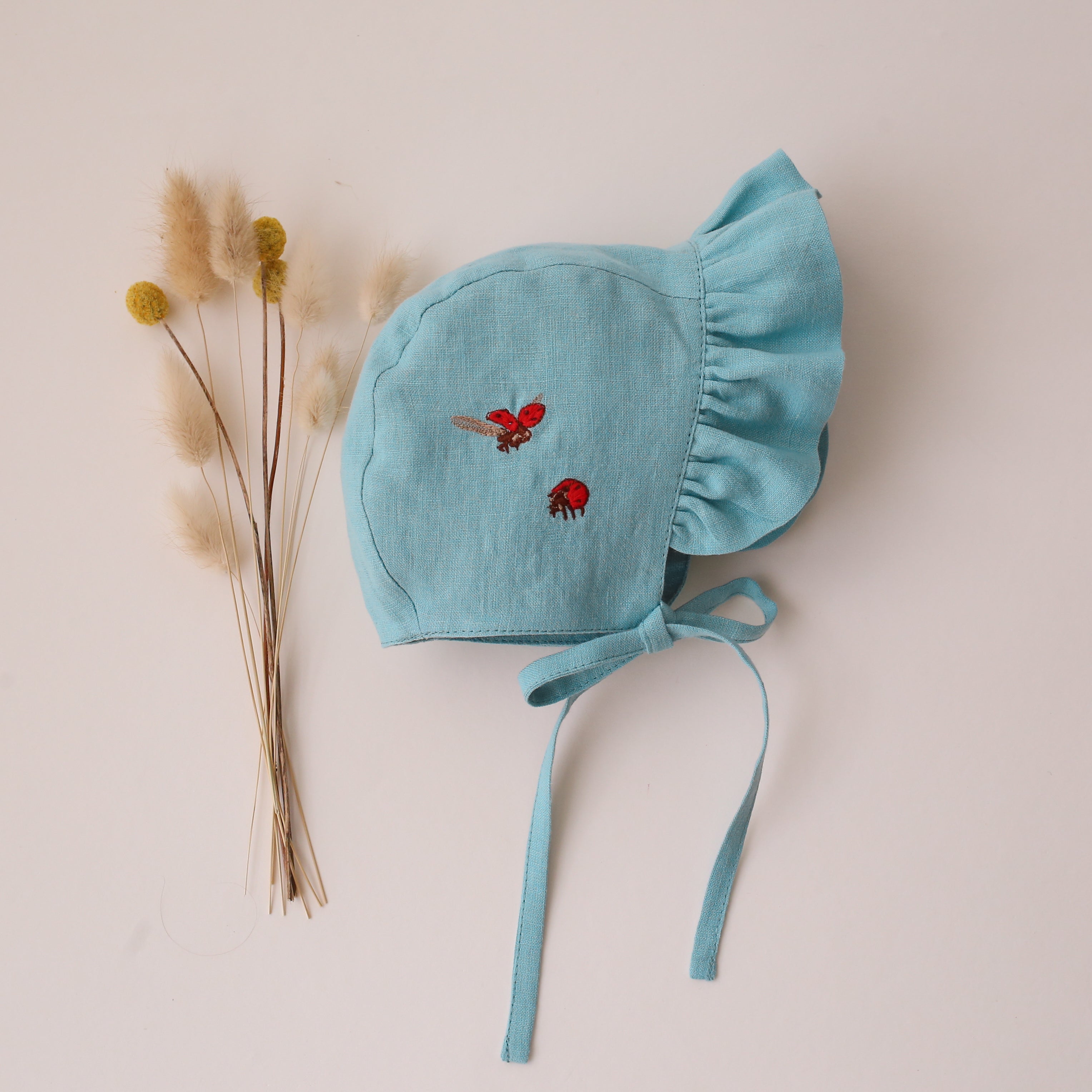 Duck Egg Blue Linen Ruffle Brimmed Bonnet with “Ladybugs” Embroidery