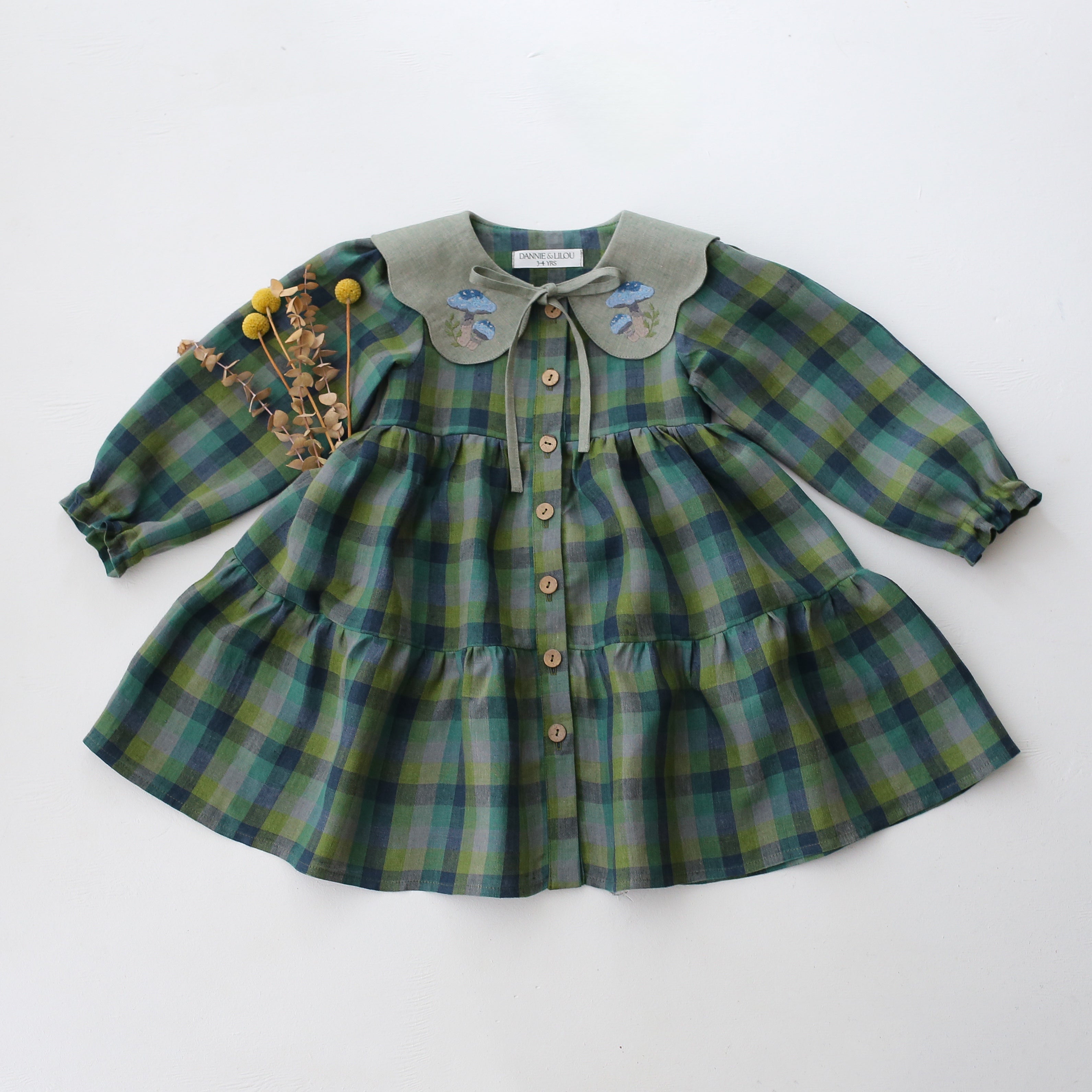 Moss Green Check Linen Long Sleeve Tiered Dress with Petal Collar in Green Smoke Linen with "Blue Mushrooms" Embroidery