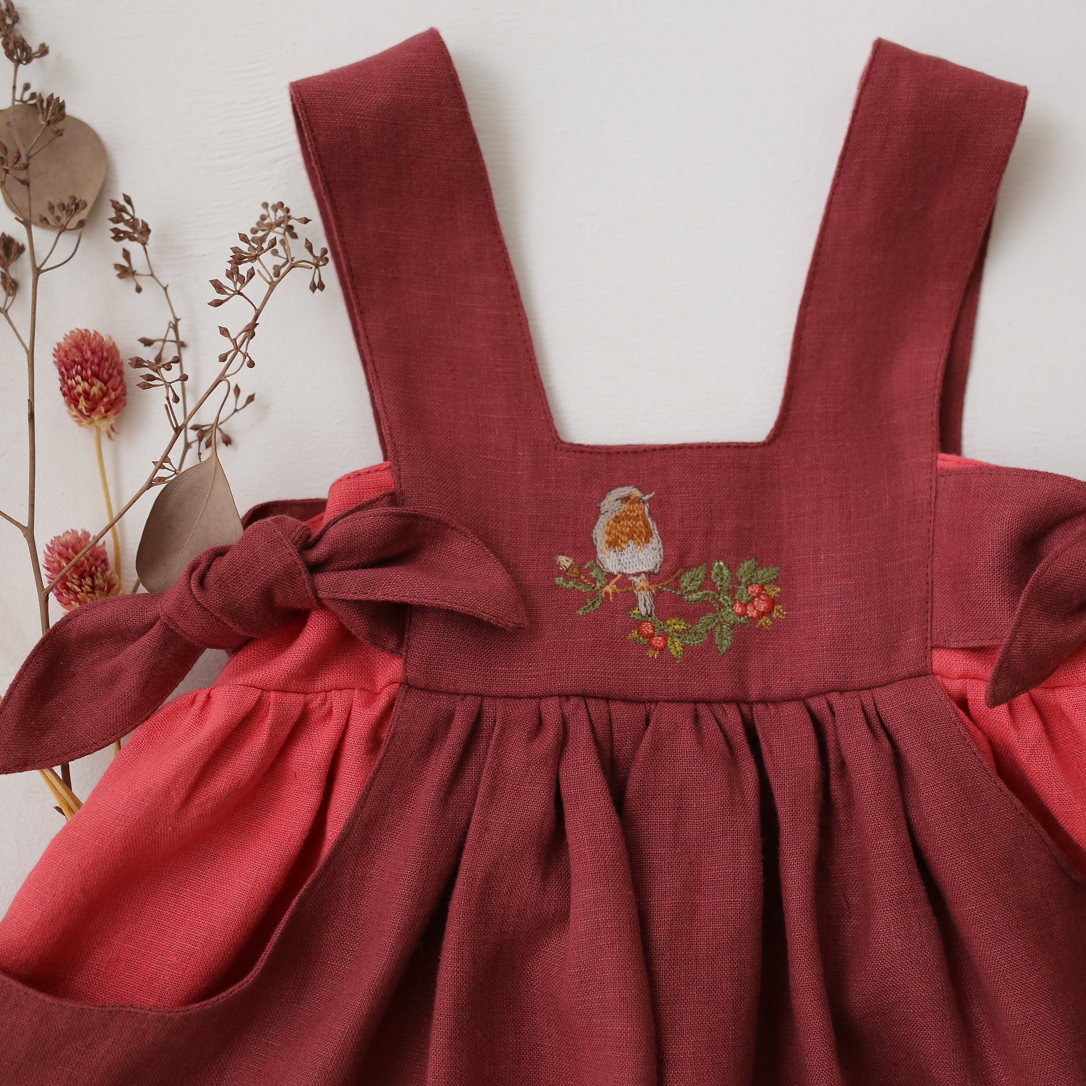 Rosewood Linen Square Neckline Pinafore with Coral Linen Pockets & “Bird on Berry Branch” Embroidery