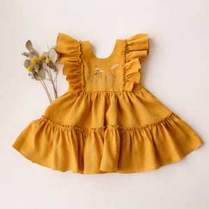 Amber Linen Ruffled Front Tiered Dress with “Meadow Flowers with Bee” Embroidery