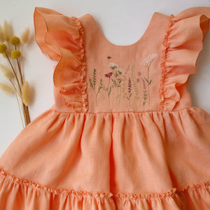 Peach Linen Ruffled Front Tiered Dress with “Meadow Flowers with Bee” Embroidery