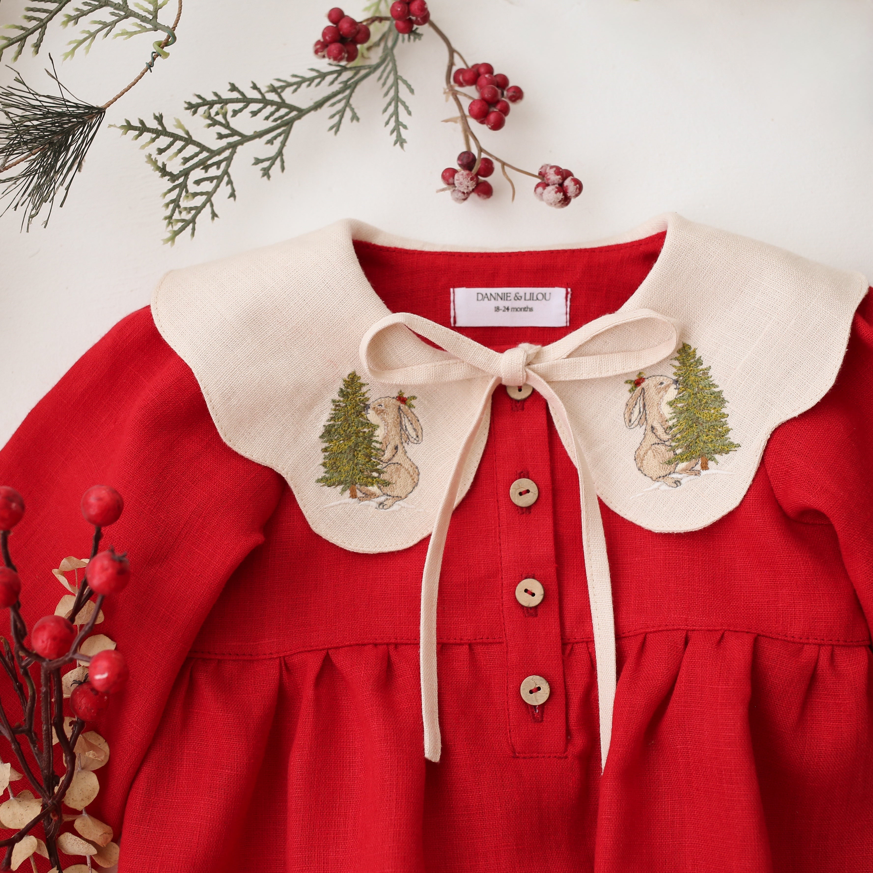 Scarlet Red Linen Long Sleeve Bubble Playsuit with Petal Collar in Ivory Linen with "Christmas Tree & Bunny” Embroidery