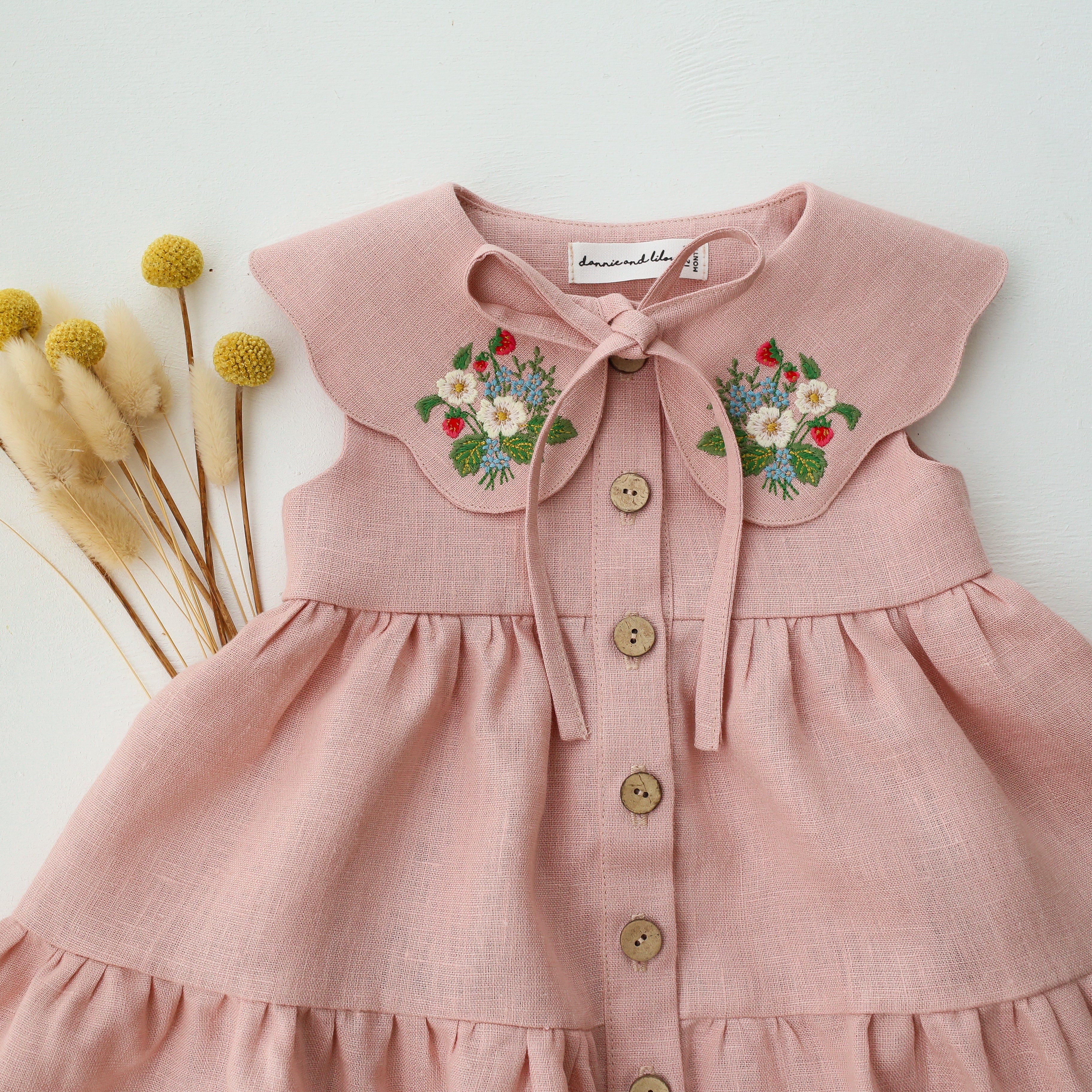 Powder Linen Tiered Dress with Petal Collar in Powder Linen with "Strawberry Bouquet" Embroidery