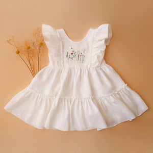 Milk Linen Ruffled Front Tiered Dress with “Meadow Flowers” Embroidery