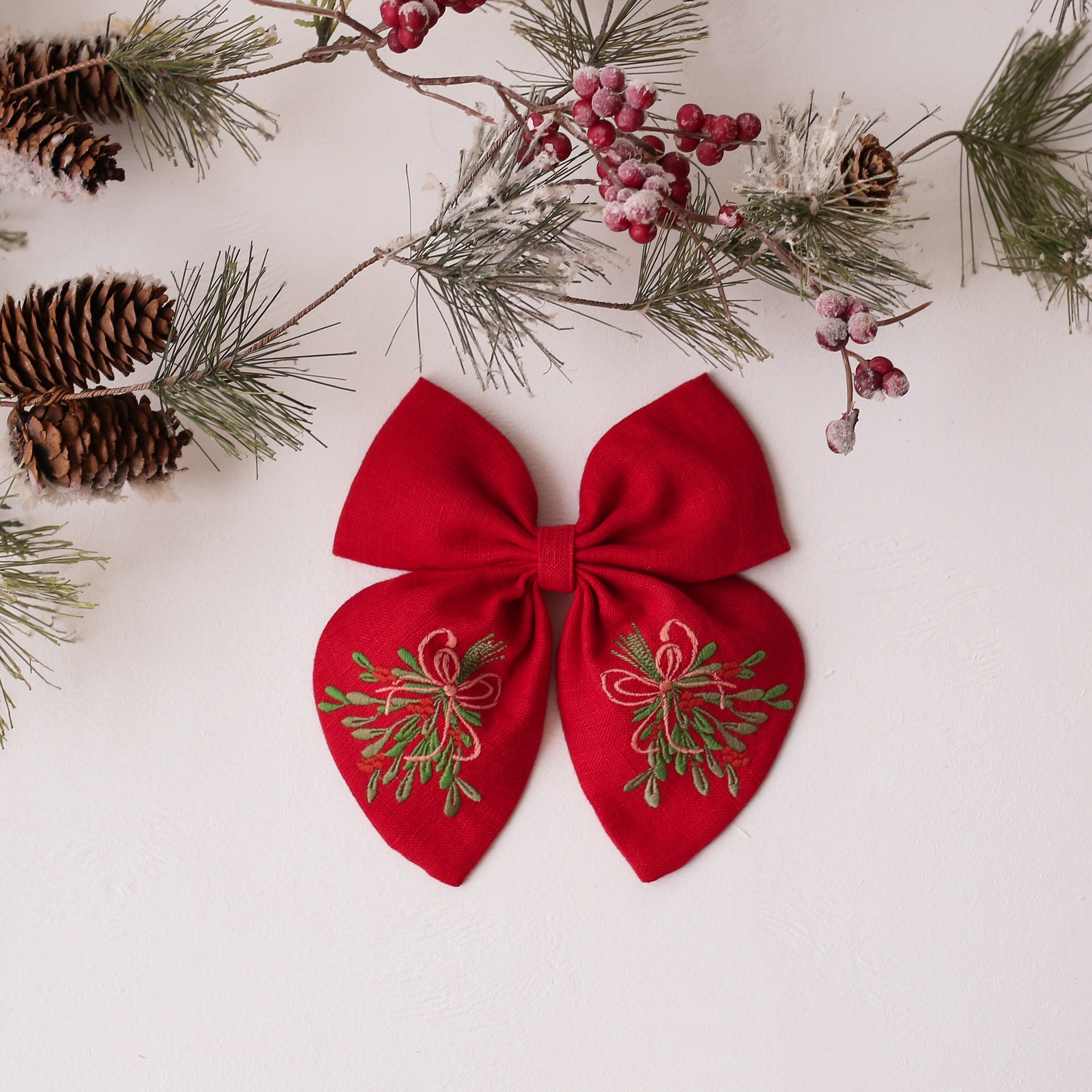 Embroidered Hair Bow with "Christmas Mistletoe" Embroidery in Scarlet Red Linen