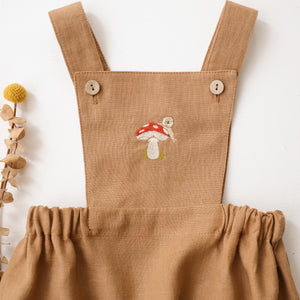 Latte Linen Pinafore Romper with “Toadstool with Snail” Embroidery