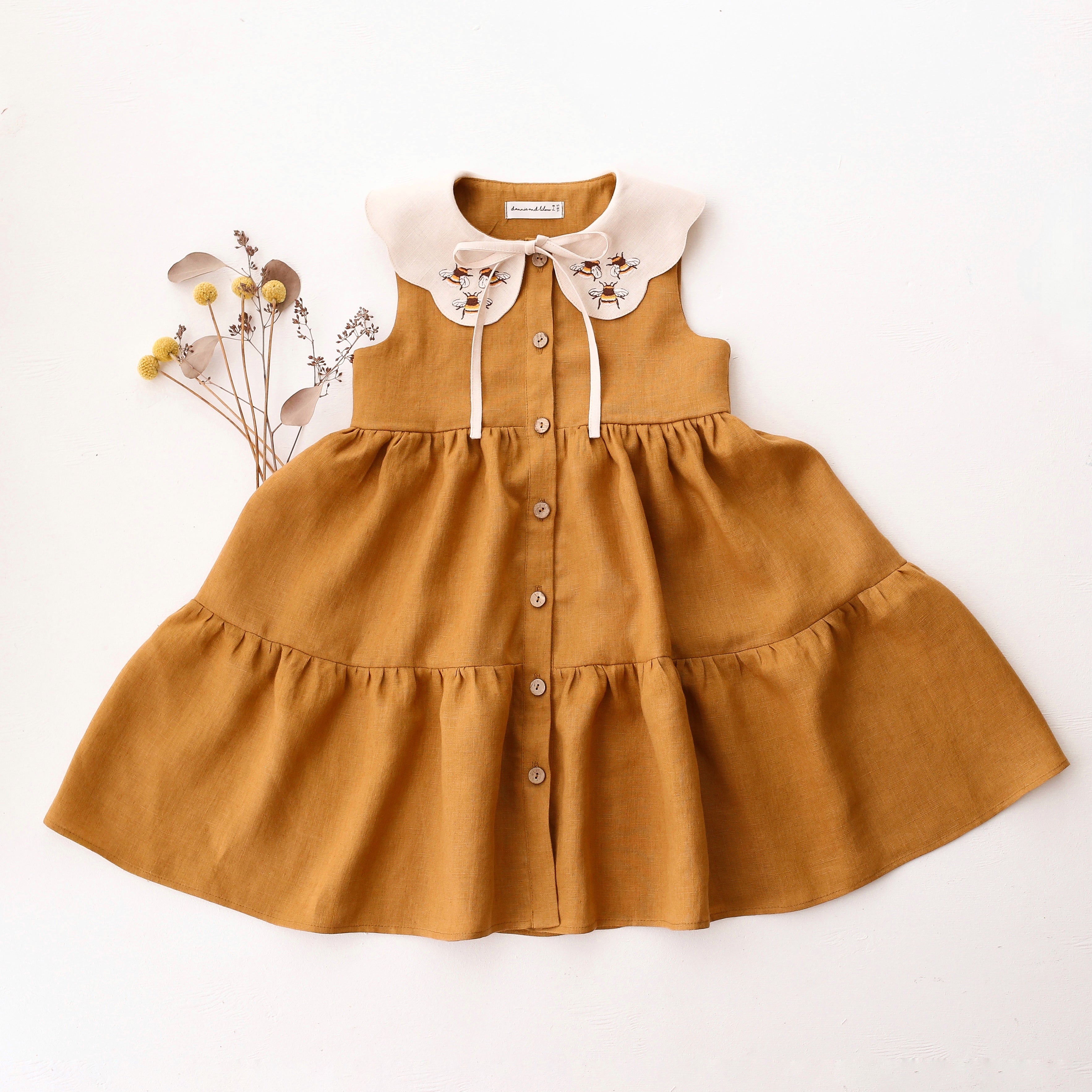 Mustard Linen Tiered Dress with Petal Collar in Ivory Linen with "3 Bumblebees" Embroidery