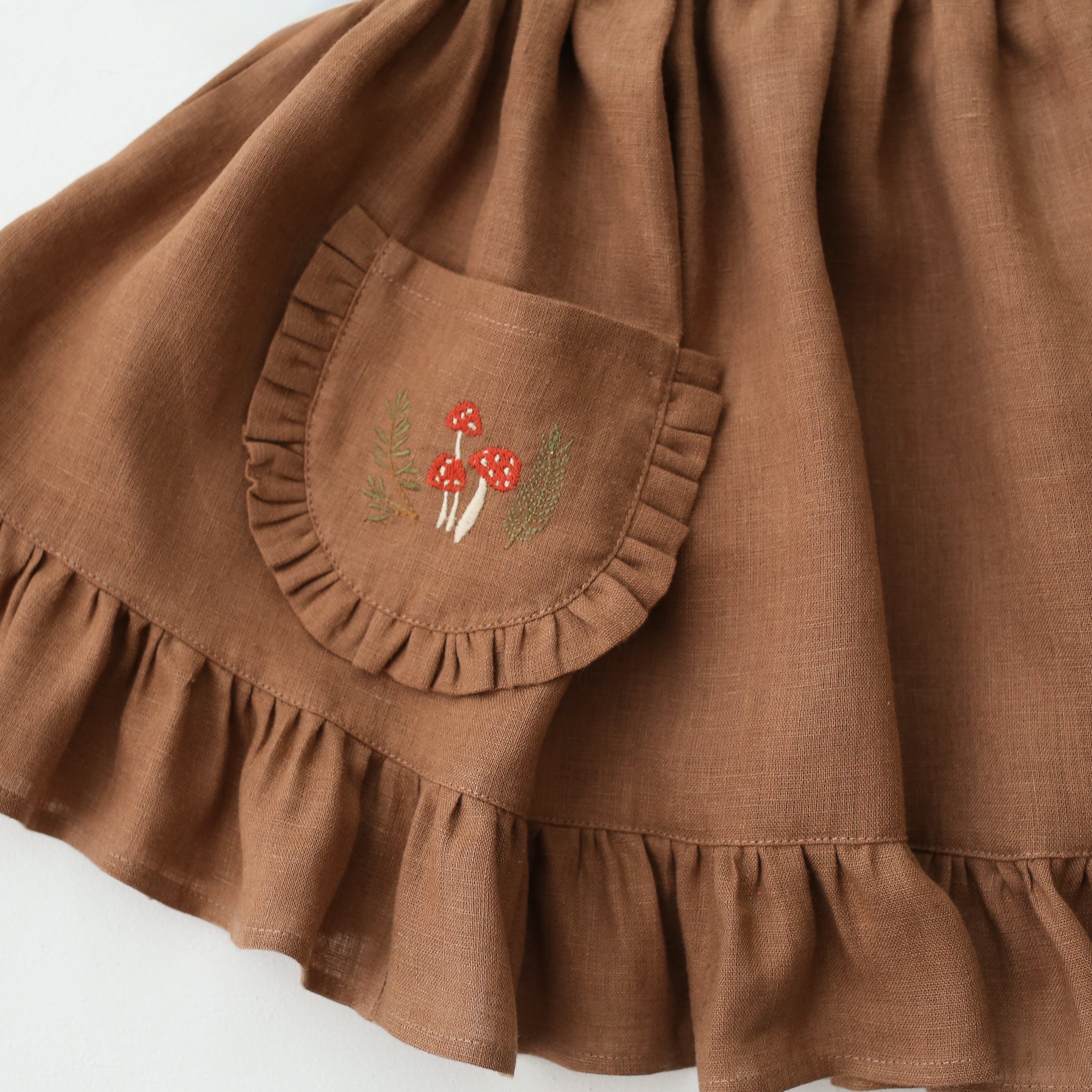 Cocoa Brown Linen Straps Pinafore with Frills with “Tiny Mushrooms” Embroidery