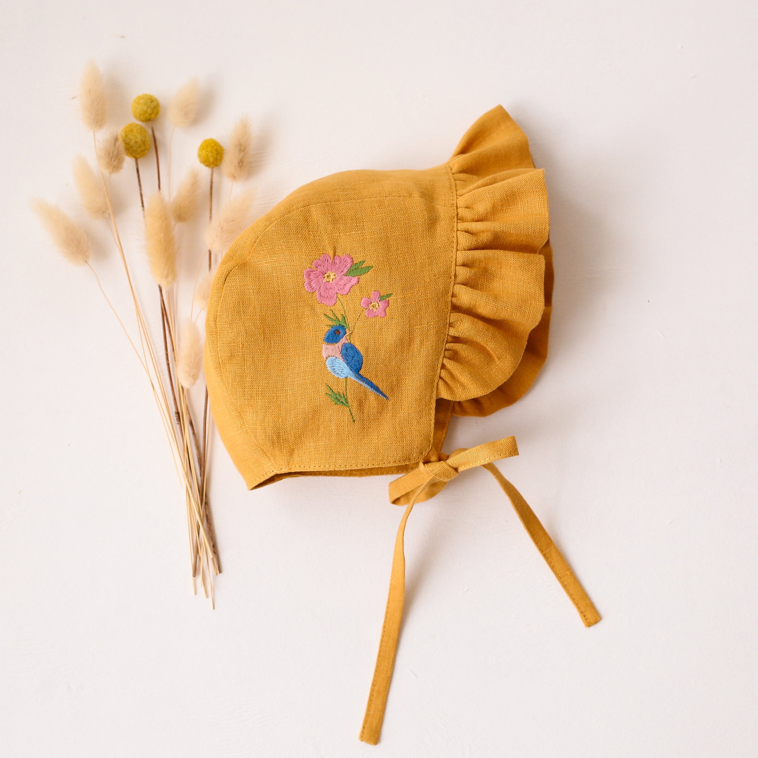Amber Linen Ruffle Brimmed Bonnet with “Bird on Flower” Embroidery