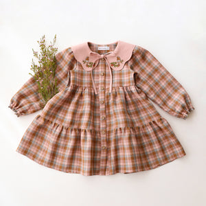 Hazel Rose Check Linen Long Sleeve Tiered Dress with Petal Collar in Powder Linen with "Bird on Berry Branch" Embroidery