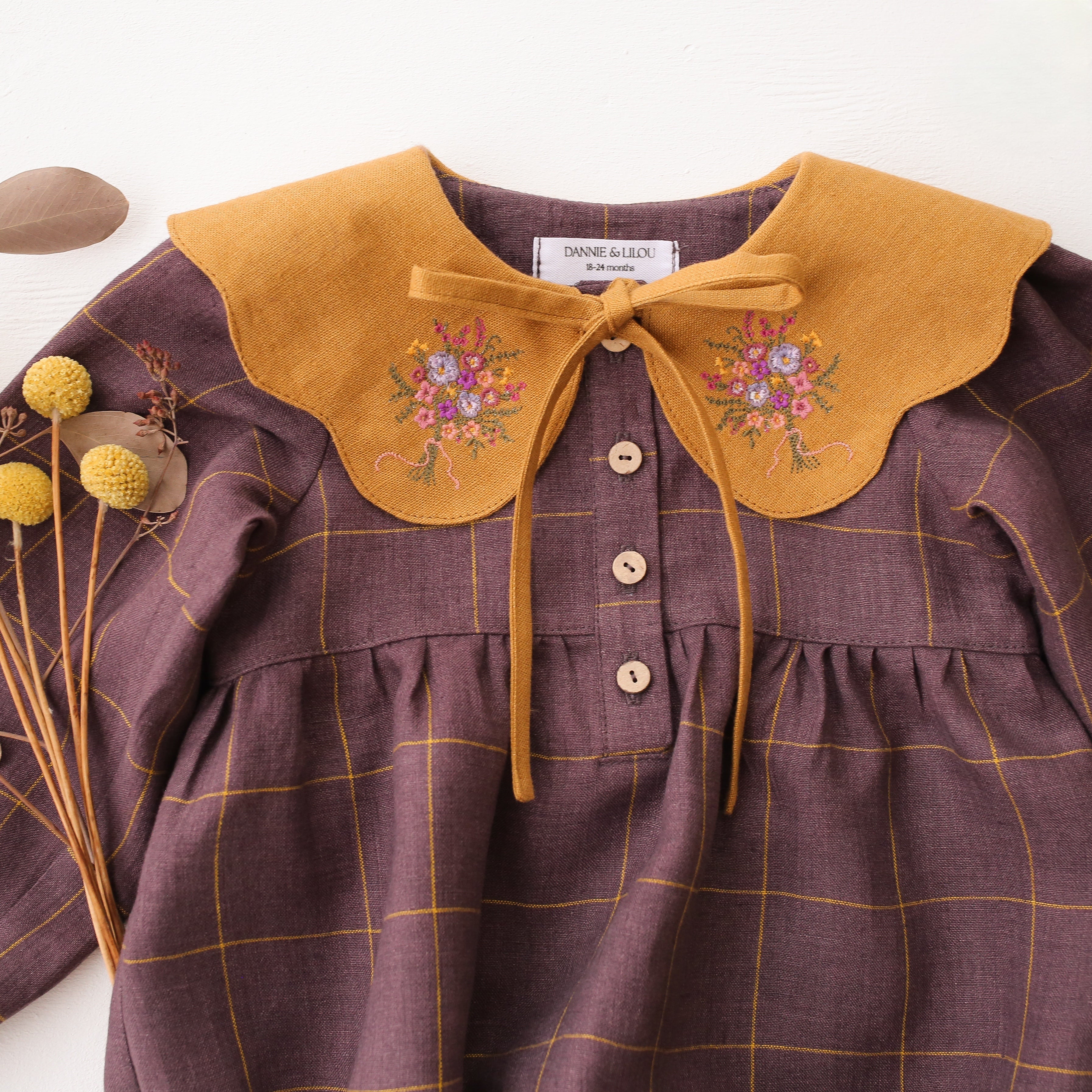 Plum Check Linen Long Sleeve Bubble Playsuit with Petal Collar in Mustard Linen with "Wild Meadow Bouquet" Embroidery