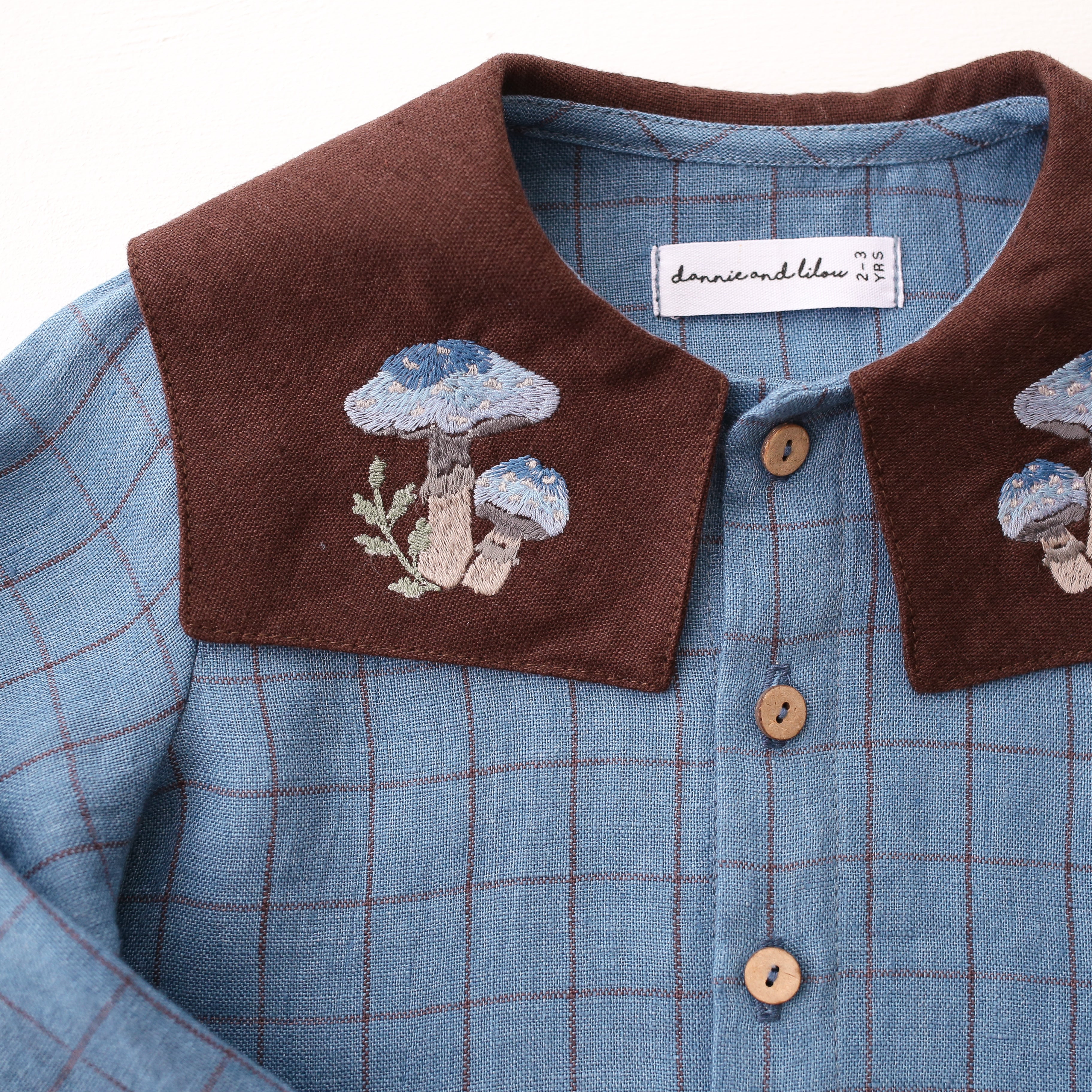 Woodland Sky Check Linen Long Sleeve Button Front Top with Square Collar and " Blue Mushrooms" Embroidery