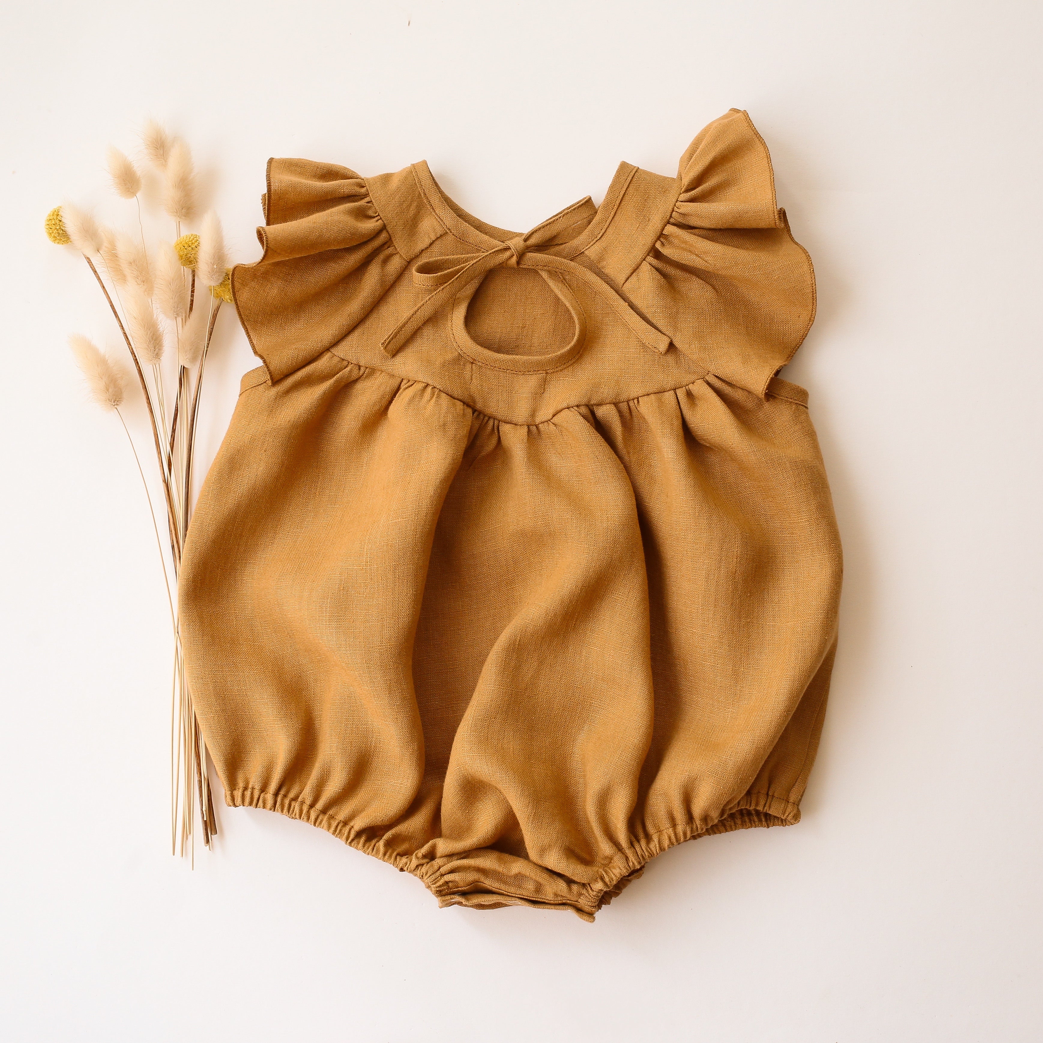 Mustard Linen Flutter Sleeve Tie Back Bubble Playsuit